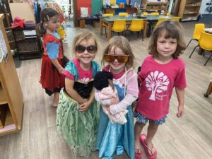 big imaginations at play in home corner