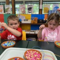busy little hands threading bright beads busy little hands threading bright beads